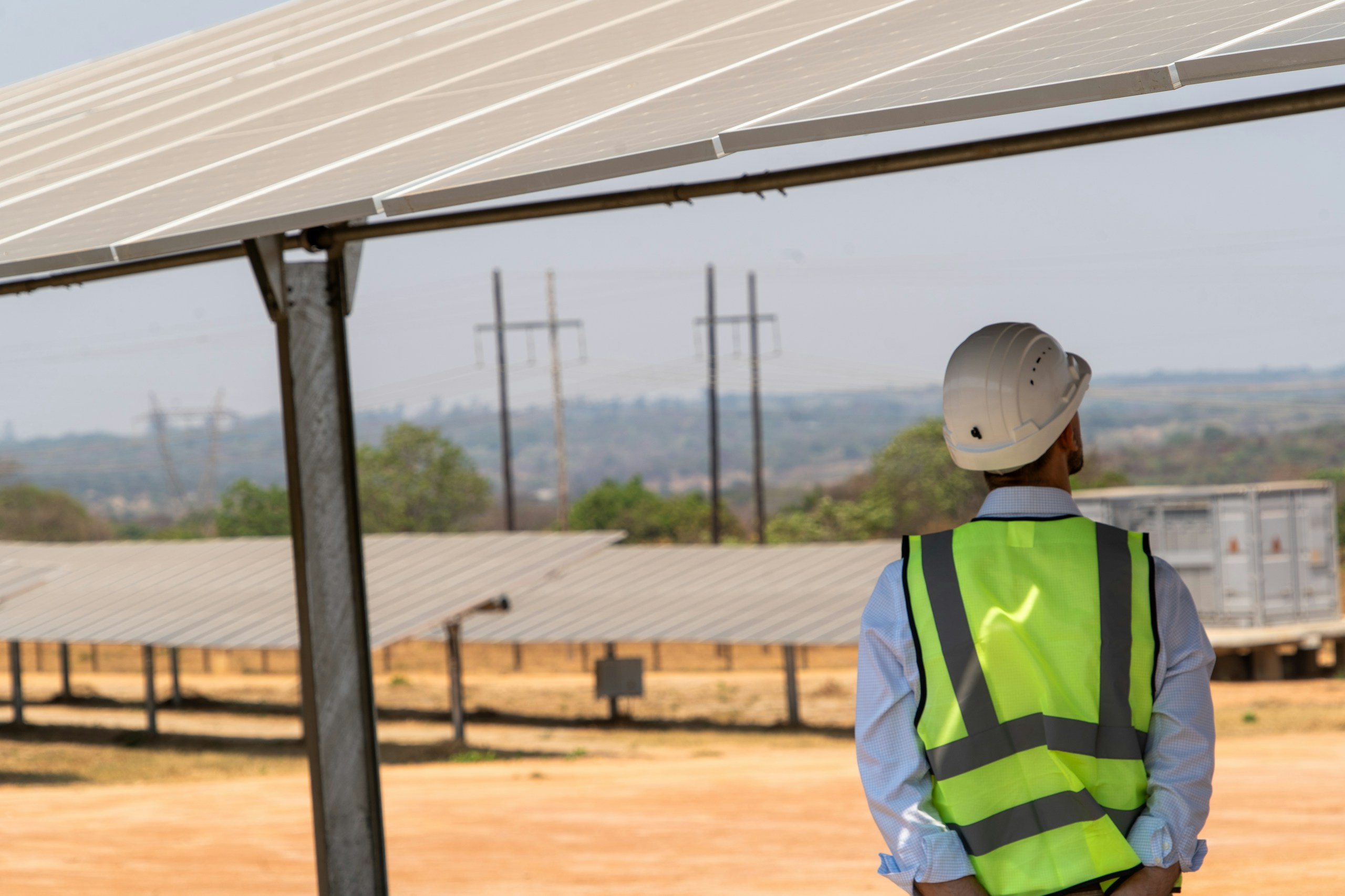 Engineer inspecting solar plant